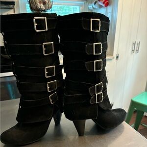 Women’s black size 8 suede heeled boot with buckles.